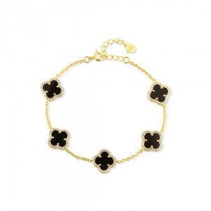 Bransoletka srebrna pozłacana z koniczynami zdobionymi onyksem