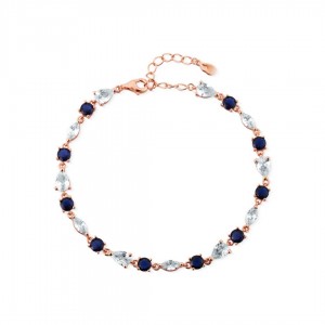 Bransoletka srebrna rose gold zdobiona białymi i granatowymi cyrkoniami