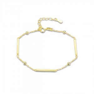 Bransoletka srebrna pozłacana - kulki z podłużnymi elementami 