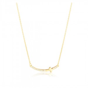 Naszyjnik srebrny pozłacany - poprzeczny krzyż wysadzany cyrkoniami