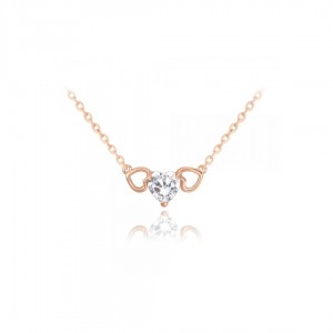 Naszyjnik rose gold z białą cyrkonią - trzy serca